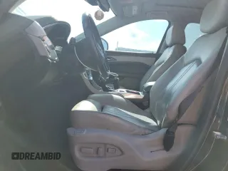 2013 Cadillac SRX Performance Collection with VIN 3GYFNHE37DS649235, listed as a Copart auction lot 56939285 with 104,692 mi miles and Salvage title. Bid and sale history available at DreamBid. Image 7.