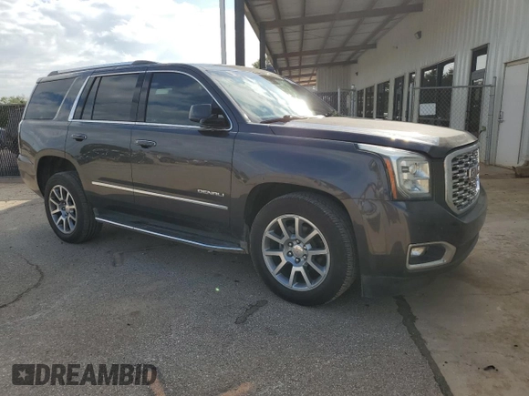 2018 GMC Yukon Denali with VIN 1GKS1CKJ4JR244135, listed as a Copart auction lot 71445964 with 148,375 mi miles and Salvage Title. Bid and sale history available at carsss.com. Image 4.