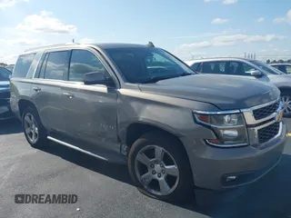 2018 Chevrolet Tahoe LT with VIN 1GNSCBKCXJR183012, listed as a IAAI auction lot 42222952 with 118,703 mi miles and . Bid and sale history available at DreamBid. Image 1.