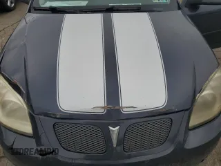 2009 Pontiac G5 z VIN 1G2AL18HX97232495, wystawiony jako Copart lot #48197645 z przebiegiem 201 586 mil mil oraz Szkoda całkowita • Salvage title. Historia ofert i sprzedaży dostępna na DreamBid. Obrazek 11.