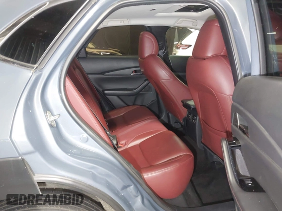 2022 Mazda CX-30 S Carbon Edition with VIN 3MVDMBCL8NM447234, listed as a IAAI auction lot 42511600 with 51,926 mi miles and . Bid and sale history available at DreamBid. Image 8.