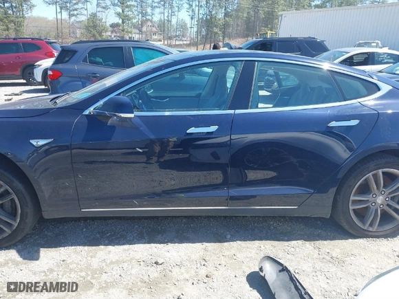 2013 Tesla Model S with VIN 5YJSA1CNXDFP20609, listed as a IAAI auction lot 41831300 with 156541 miles. Bid and sale history available at carsss.com. Image 15.