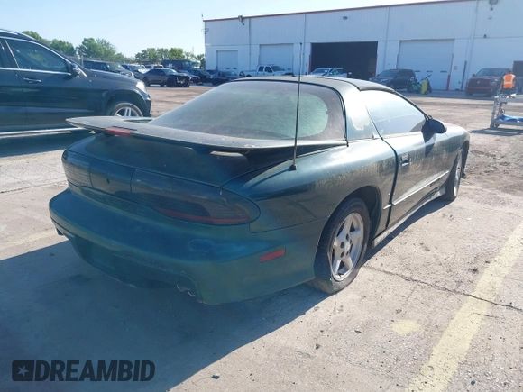 1996 Pontiac Firebird Formula with VIN 2G2FV22P5T2221912, listed as a IAAI auction lot 42004189 with 130,655 mi miles and . Bid and sale history available at DreamBid. Image 4.