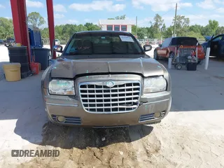 2010 Chrysler 300 Touring with VIN 2C3CA5CV5AH233033, listed as a IAAI auction lot 42130676 with 158,323 mi miles and . Bid and sale history available at DreamBid. Image 6.
