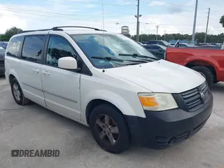 2010 Dodge Grand Caravan SXT z VIN 2D4RN5D1XAR331770, wystawiony jako IAAI lot #41686902 z przebiegiem 141 671 mil mil oraz . Historia ofert i sprzedaży dostępna na DreamBid. Obrazek 1.
