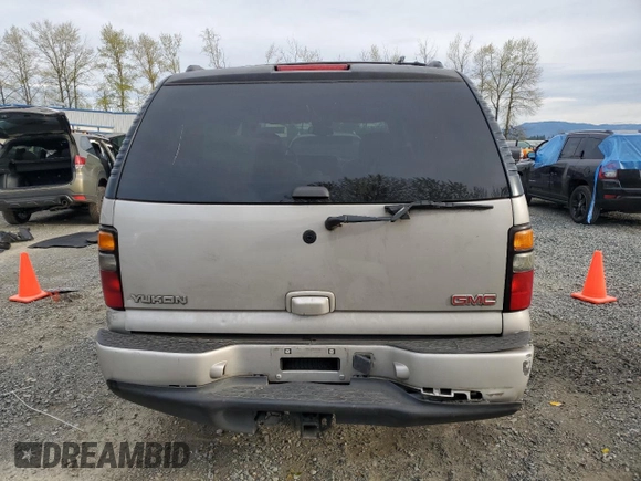 2005 GMC Yukon Denali z VIN 1GKEK63U65J262371, wystawiony jako Copart lot #52773425 z przebiegiem 129 028 mil mil oraz Czysty tytuł • Clean title. Historia ofert i sprzedaży dostępna na DreamBid. Obrazek 6.