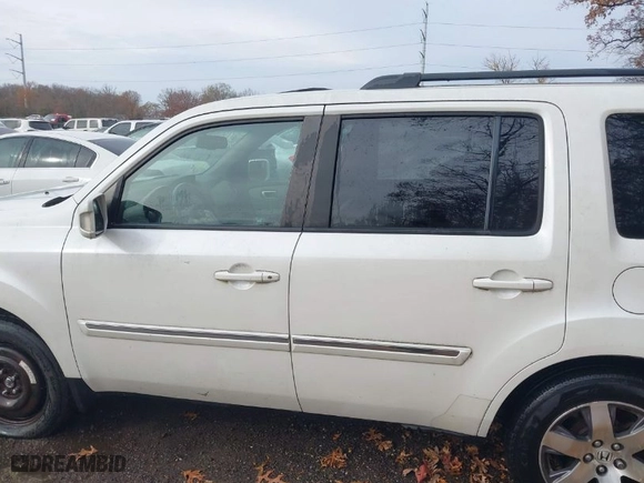 2012 Honda Pilot Touring with VIN 5FNYF4H93CB029123, listed as a IAAI auction lot 40890496 with 147,766 mi miles. Bid and sale history available at carsss.com. Image 15.