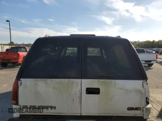 1999 GMC Suburban z VIN 3GKFK16RXXG503321, wystawiony jako Copart lot #77568614 z przebiegiem Nie podano mil oraz Tytuł czysty. Historia ofert i sprzedaży dostępna na DreamBid. Obrazek 6.