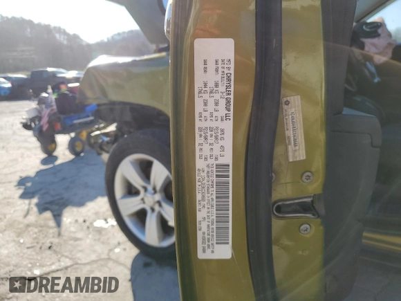 2012 Jeep Compass Latitude with VIN 1C4NJDEB6CD630669, listed as a Copart auction lot 52028235 with 124,123 mi miles and Salvage Title. Bid and sale history available at DreamBid. Image 16.