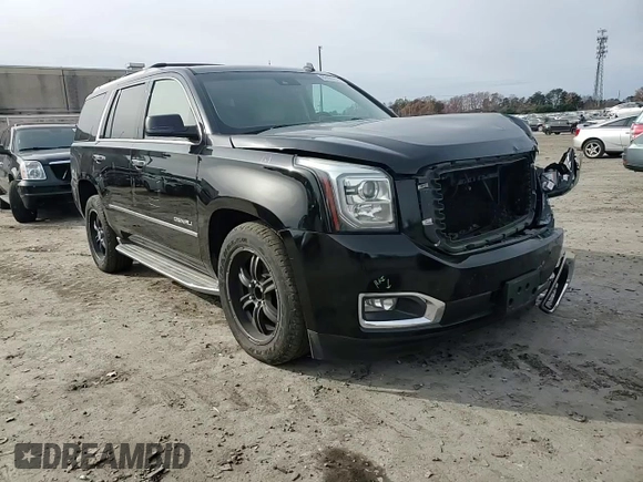 2015 GMC Yukon Denali with VIN 1GKS1CKJ1FR303049, listed as a Copart auction lot 82435514 with 100,693 mi miles and Salvage Title. Bid and sale history available at carsss.com. Image 11.
