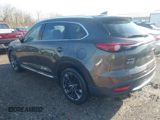 2016 Mazda CX-9 Grand Touring z VIN JM3TCBDY3G0104001, wystawiony jako IAAI lot #41961054 z przebiegiem 77 057 mil mil oraz . Historia ofert i sprzedaży dostępna na DreamBid. Obrazek 3.