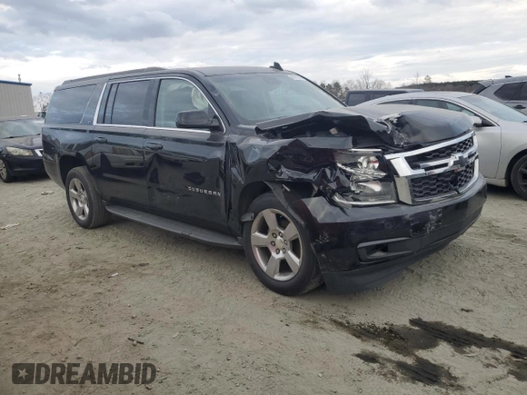 2019 Chevrolet Suburban LT with VIN 1GNSCHKC8KR127431, listed as a Copart auction lot 43931515 with 123,338 mi miles and Salvage Title. Bid and sale history available at DreamBid. Image 4.