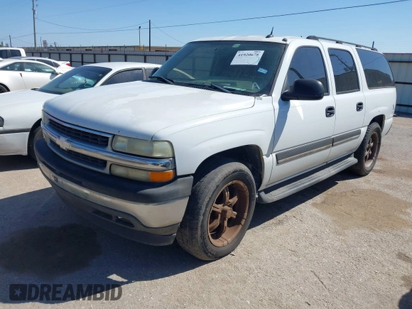 2005 Chevrolet Suburban LT z VIN 1GNEC16ZX5J100236, wystawiony jako IAAI lot #41920678 z przebiegiem 221 124 mil mil oraz . Historia ofert i sprzedaży dostępna na DreamBid. Obrazek 2.