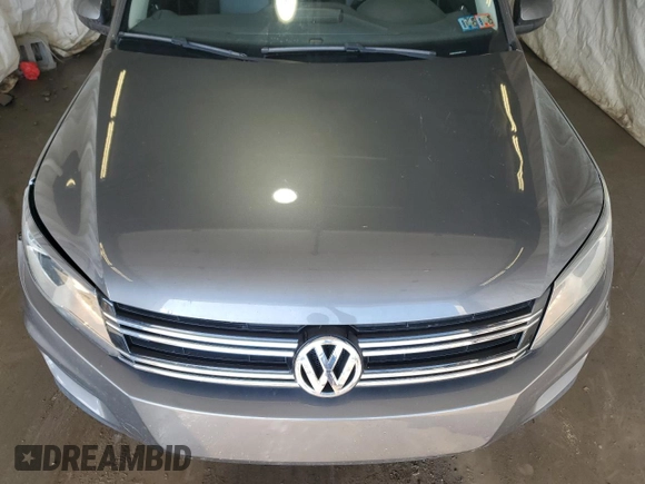2014 Volkswagen Tiguan SEL with VIN WVGBV3AX2EW541476, listed as a Copart auction lot 64817795 with 158,032 mi miles and Salvage title. Bid and sale history available at DreamBid. Image 12.