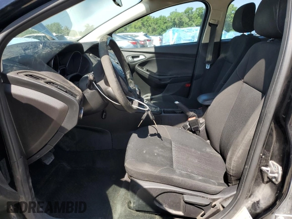 2018 Ford Focus SE z VIN 1FADP3FEXJL256542, wystawiony jako Copart lot #54583915 z przebiegiem 107 774 mil mil oraz Szkoda całkowita • Salvage title. Historia ofert i sprzedaży dostępna na DreamBid. Obrazek 7.