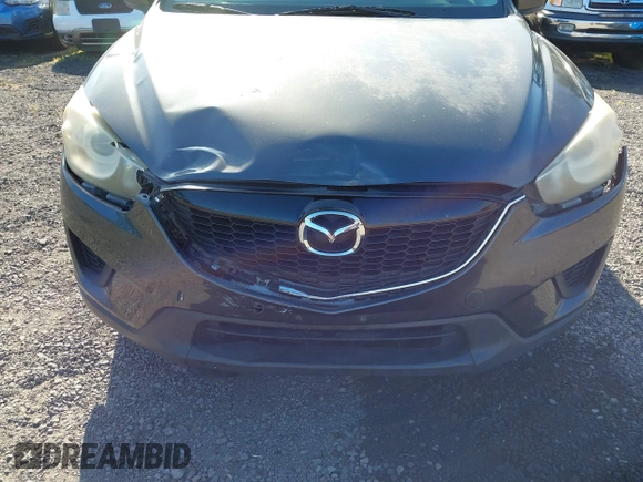 2014 Mazda CX-5 Sport with VIN JM3KE2BE8E0313407, listed as a IAAI auction lot 41215428 with 120,387 mi miles and . Bid and sale history available at carsss.com. Image 6.