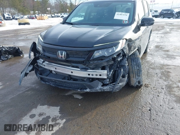 2022 Honda Pilot Special Edition z VIN 5FNYF6H24NB007312, wystawiony jako IAAI lot #41407151 z przebiegiem 32 052 mil mil oraz . Historia ofert i sprzedaży dostępna na DreamBid. Obrazek 6.