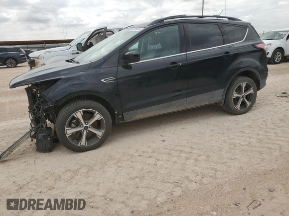 2017 Ford Escape SE with VIN 1FMCU9G93HUB66829, listed as a Copart auction lot 69093414 with 99,569 mi miles and Salvage Title. Bid and sale history available at carsss.com. Image 1.