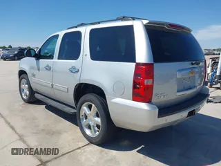 2013 Chevrolet Tahoe LT with VIN 1GNSCBE07DR164486, listed as a IAAI auction lot 42216421 with 220,395 mi miles and . Bid and sale history available at DreamBid. Image 3.