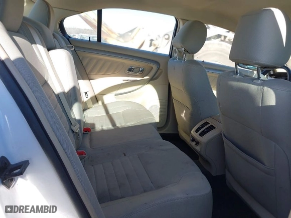2018 Ford Taurus SE with VIN 1FAHP2D85JG127853, listed as a IAAI auction lot 41596548 with 128,087 mi miles. Bid and sale history available at carsss.com. Image 8.