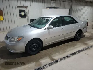 2002 Toyota Camry LE z VIN 4T1BE32K32U063577, wystawiony jako Copart lot #58782185 z przebiegiem 243 589 mil mil oraz Szkoda całkowita • Salvage title. Historia ofert i sprzedaży dostępna na DreamBid. Obrazek 1.