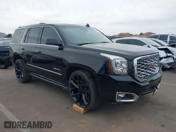 2018 GMC Yukon Denali with VIN 1GKS1CKJ1JR110344, listed as a IAAI auction lot 41720092 with 82,296 mi miles. Bid and sale history available at carsss.com. Image 1.