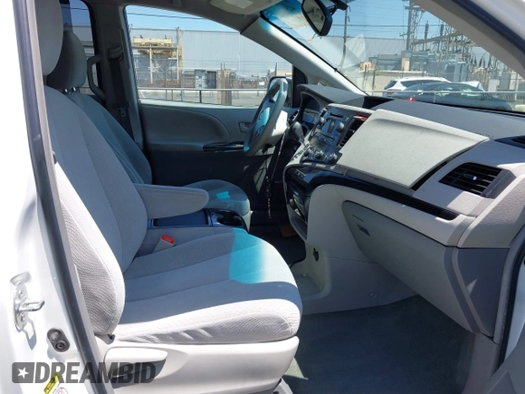 2011 Toyota Sienna LE AAS with VIN 5TDKK3DC3BS164612, listed as a IAAI auction lot 42302123 with 165,941 mi miles and . Bid and sale history available at DreamBid. Image 5.