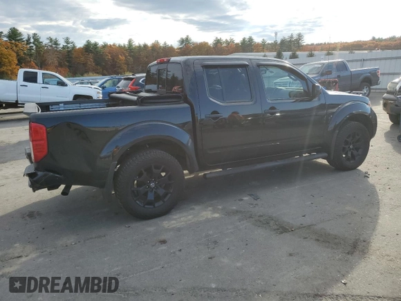 2020 Nissan Frontier Pro-4X with VIN 1N6ED0EB3LN710650, listed as a Copart auction lot 77419464 with 97,399 mi miles and Salvage title. Bid and sale history available at DreamBid. Image 3.