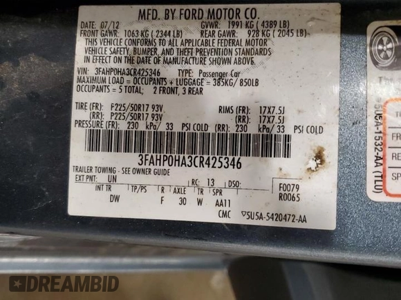 2012 Ford Fusion SE z VIN 3FAHP0HA3CR425346, wystawiony jako Copart lot #60815425 z przebiegiem 163 465 mil mil oraz Szkoda całkowita • Salvage title. Historia ofert i sprzedaży dostępna na DreamBid. Obrazek 12.