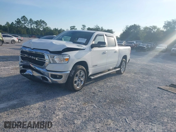 2021 Ram 1500 Big Horn with VIN 1C6SRFFT3MN570531, listed as a IAAI auction lot 42736203 with 84,050 mi miles and . Bid and sale history available at DreamBid. Image 2.
