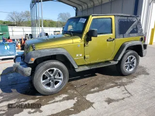 2008 Jeep Wrangler X with VIN 1J4FA24168L609202, listed as a Copart auction lot 52901975 with 165,083 mi miles and Salvage Title. Bid and sale history available at DreamBid. Image 1.