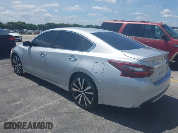 2017 Nissan Altima SV with VIN 1N4AL3AP2HC164553, listed as a IAAI auction lot 42215405 with 117,736 mi miles and . Bid and sale history available at DreamBid. Image 3.