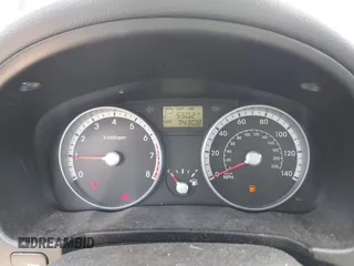 2009 Hyundai Accent Auto GLS z VIN KMHCN46C69U326197, wystawiony jako IAAI lot #42268198 z przebiegiem 74 308 mil mil oraz . Historia ofert i sprzedaży dostępna na DreamBid. Obrazek 7.