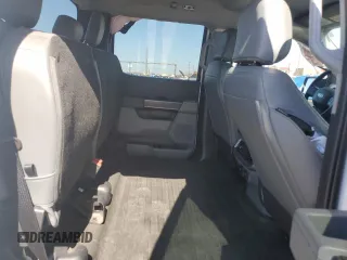 2023 Ford F-150 Lightning Pro с VIN 1FTVW1EL2PWG13712, выставлен на аукционе Copart как лот 56950955 с пробегом 60 605 миль миль и Списание • Salvage title. История ставок и продаж доступна на DreamBid. Изображение 10.