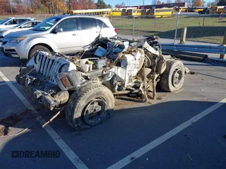 1999 Jeep Wrangler Sport with VIN 1J4FY19S7XP455887, listed as a IAAI auction lot 40863678 with 1 mi miles. Bid and sale history available at carsss.com. Image 2.