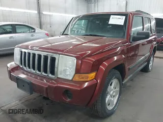 2007 Jeep Commander Sport with VIN 1J8HG48K97C518217, listed as a IAAI auction lot 42124862 with 198,371 mi miles. Bid and sale history available at carsss.com. Image 2.