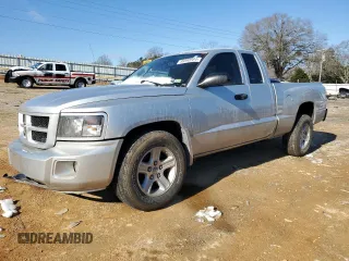 2010 Dodge Dakota with VIN 1D7CE3BK7AS119870, listed as a Copart auction lot 86590584 with 110,734 mi miles and Salvage title. Bid and sale history available at DreamBid. Image 1.