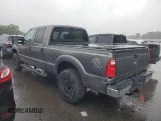 2014 Ford F-250 XL with VIN 1FT7W2B60EEA33908, listed as a Copart auction lot 54752765 with 215,428 mi miles and Salvage title. Bid and sale history available at DreamBid. Image 2.