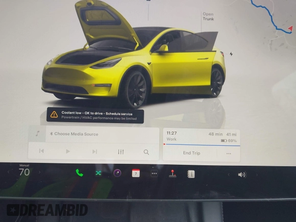 2022 Tesla Model Y Long Range with VIN 7SAYGDEE5NA016892, listed as a IAAI auction lot 41936735 with 69,136 mi miles and . Bid and sale history available at DreamBid. Image 17.