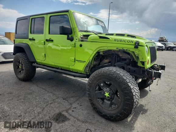 2012 Jeep Wrangler Unlimited Call of Duty MW3 z VIN 1C4BJWFG4CL242211, wystawiony jako Copart lot #59774555 z przebiegiem 117 463 mil mil oraz Szkoda całkowita • Salvage title. Historia ofert i sprzedaży dostępna na DreamBid. Obrazek 4.