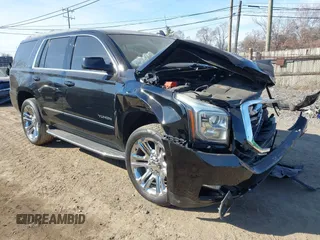 2016 GMC Yukon SLT with VIN 1GKS2BKC5GR253038, listed as a IAAI auction lot 41790030 with 101,039 mi miles. Bid and sale history available at carsss.com. Image 1.