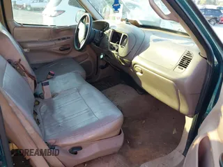 1997 Ford F-150 with VIN 1FTDX1768VNA17006, listed as a IAAI auction lot 42049325 with 206,839 mi miles and . Bid and sale history available at DreamBid. Image 5.