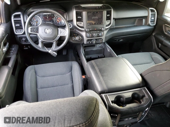2022 Ram 1500 Big Horn with VIN 1C6SRFMT3NN265986, listed as a Copart auction lot 83177674 with 27,077 mi miles and Salvage title. Bid and sale history available at DreamBid. Image 8.