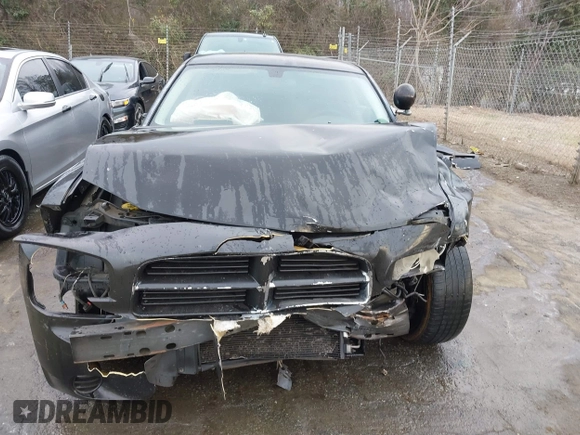 2010 Dodge Charger Police with VIN 2B3AA4CT2AH120654, listed as a IAAI auction lot 41639772 with 183,037 mi miles and . Bid and sale history available at carsss.com. Image 13.