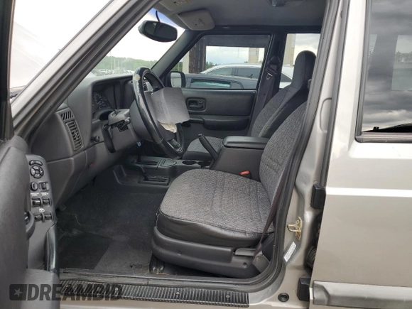 2001 Jeep Cherokee Sport with VIN 1J4FF48S91L592966, listed as a Copart auction lot 58996445 with 159,140 mi miles and Salvage title. Bid and sale history available at DreamBid. Image 7.