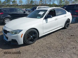 2017 BMW 3 Series 330i with VIN WBA8B9G32HNU52805, listed as a IAAI auction lot 42139448 with 136,333 mi miles. Bid and sale history available at carsss.com. Image 2.