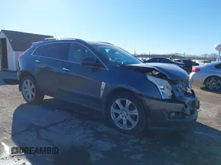 2010 Cadillac SRX Performance Collection with VIN 3GYFNBEY0AS650795, listed as a IAAI auction lot 41459597 with 136,229 mi miles. Bid and sale history available at carsss.com. Image 1.