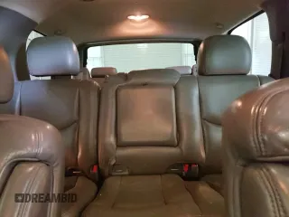 2003 GMC Yukon Denali z VIN 1GKEK63U23J136487, wystawiony jako Copart lot #57974035 z przebiegiem 280 637 mil mil oraz Tytuł czysty. Historia ofert i sprzedaży dostępna na DreamBid. Obrazek 10.