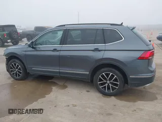 2021 Volkswagen Tiguan SE with VIN 3VV2B7AX8MM143189, listed as a IAAI auction lot 41646843 with 56,672 mi miles and . Bid and sale history available at DreamBid. Image 14.