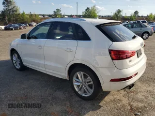 2017 Audi Q3 Premium Plus with VIN WA1HCCFS1HR013829, listed as a Copart auction lot 52827765 with 138,354 mi miles and Clean title. Bid and sale history available at DreamBid. Image 2.